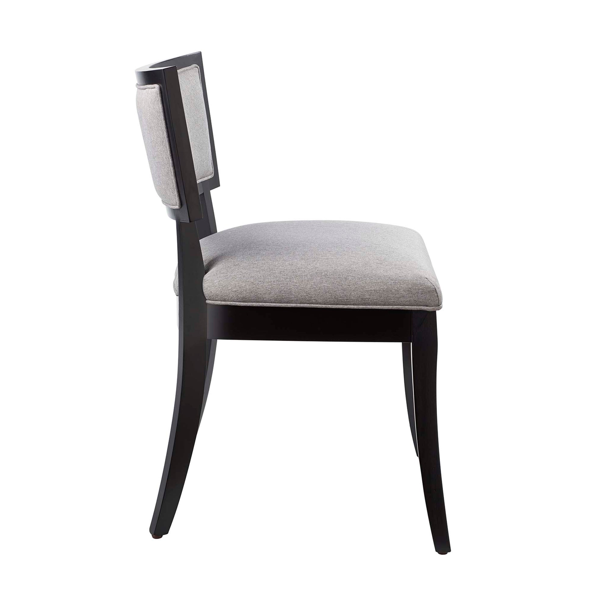 Dark wood framed chair with light gray upholstered seat and cushioned backrest, curved legs, modern classic style.