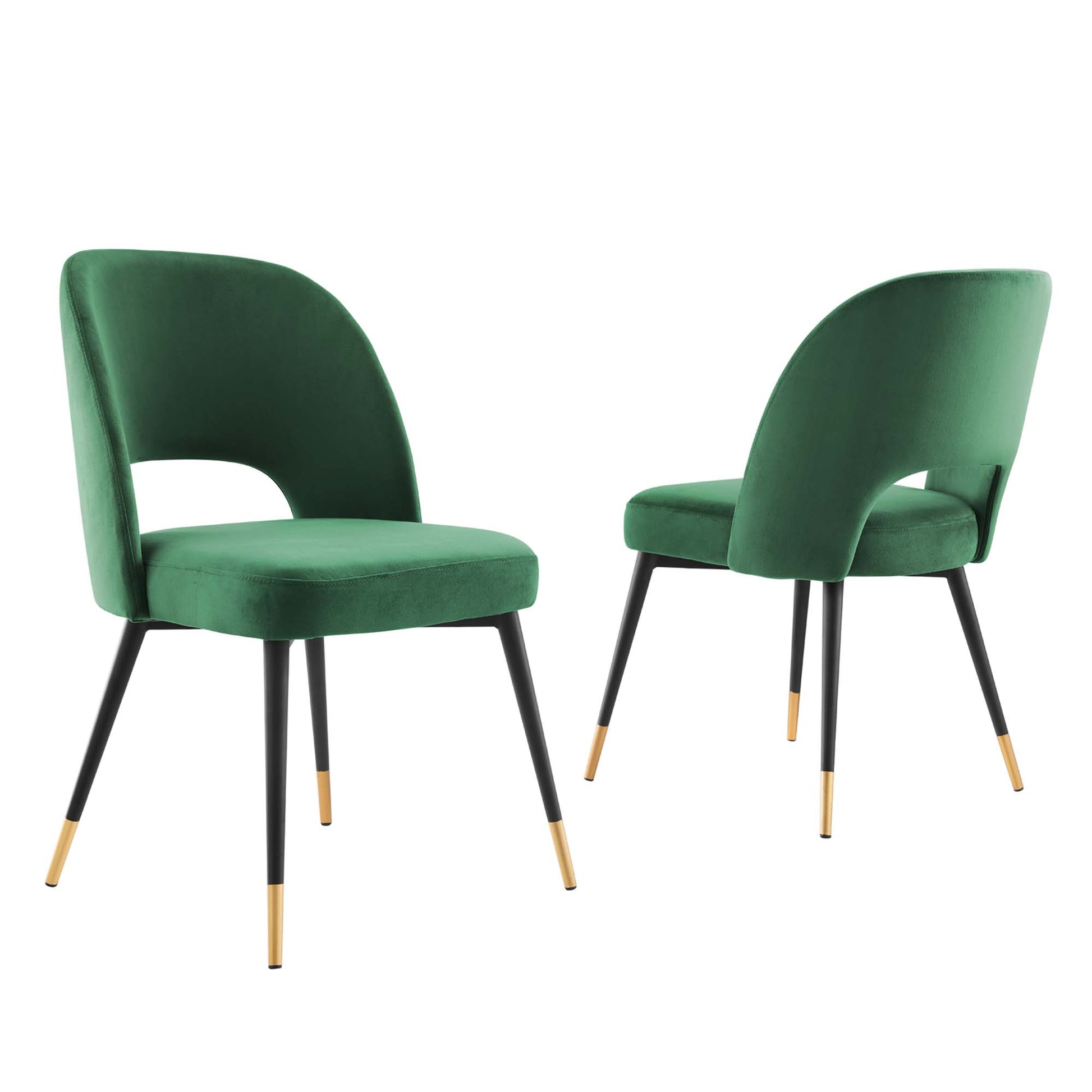 Pair of emerald green velvet dining chairs with curved backrests and black legs with gold-tipped feet.