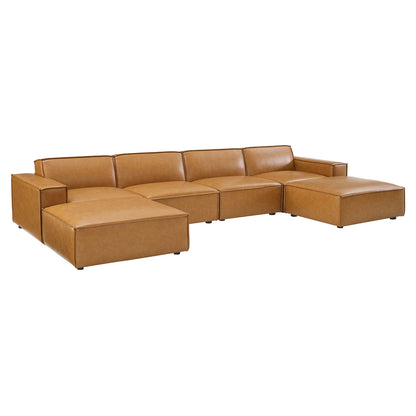 Tan leather sectional sofa with chaise on both ends, low-profile cushions, modern L-shaped lounge.