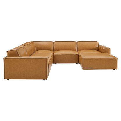 Tan vegan leather modular sectional sofa with chaise, low-profile legs and plush cushioned seats.