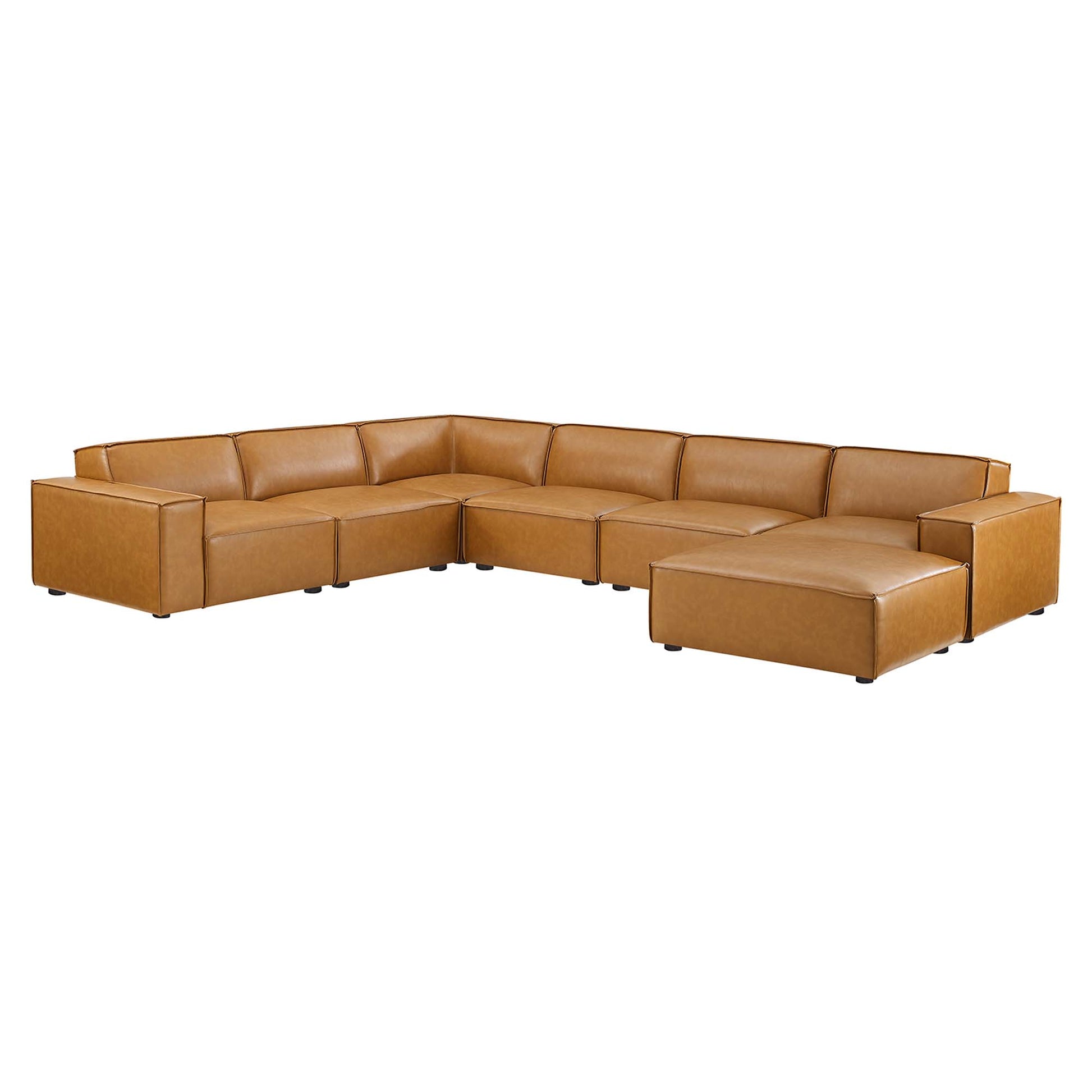 Tan vegan leather 7-piece sectional sofa in an L-shaped configuration with chaise and matching ottoman.