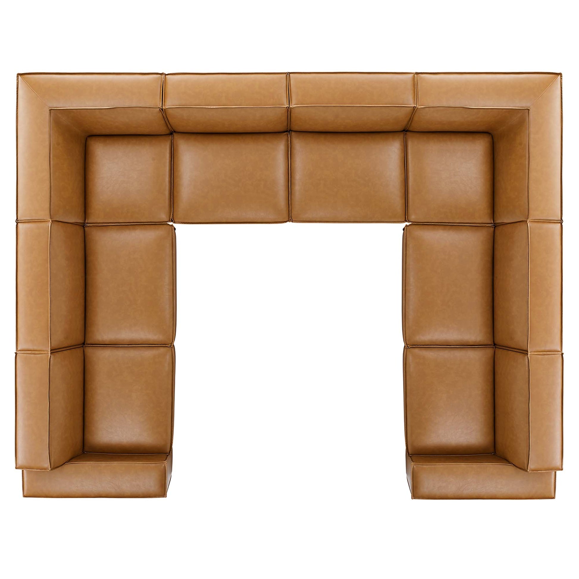 Tan vegan leather sectional sofa with padded cushions along all sides, forming a large U-shaped seating.