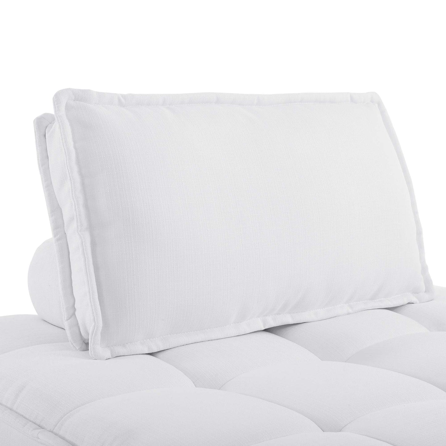White armless tufted fabric chair with piped edges.