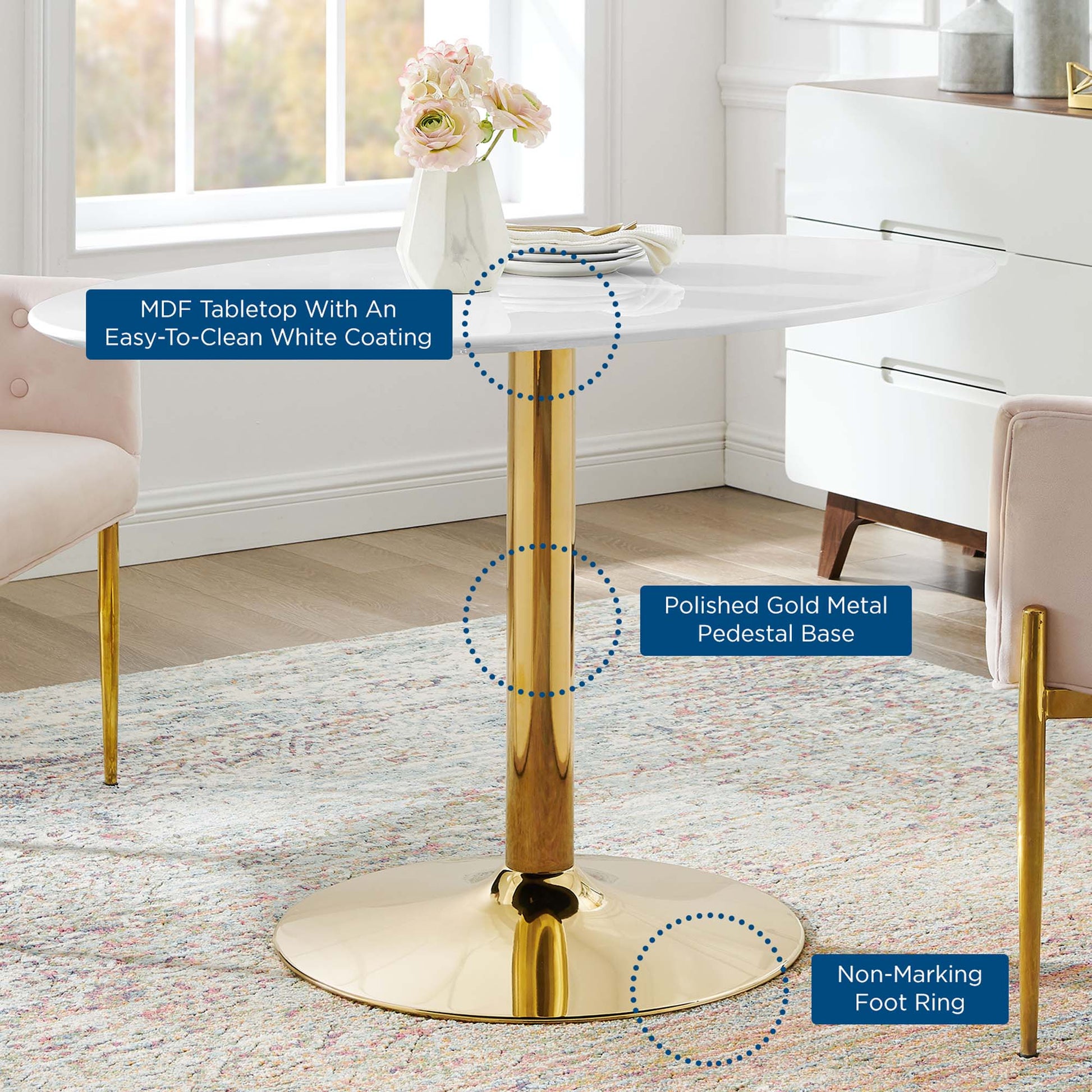 Round white MDF tabletop with easy-clean coating on a polished gold pedestal base with non-marking feet.