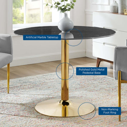 Round black artificial marble tabletop atop a polished gold pedestal base with non-marking foot ring.