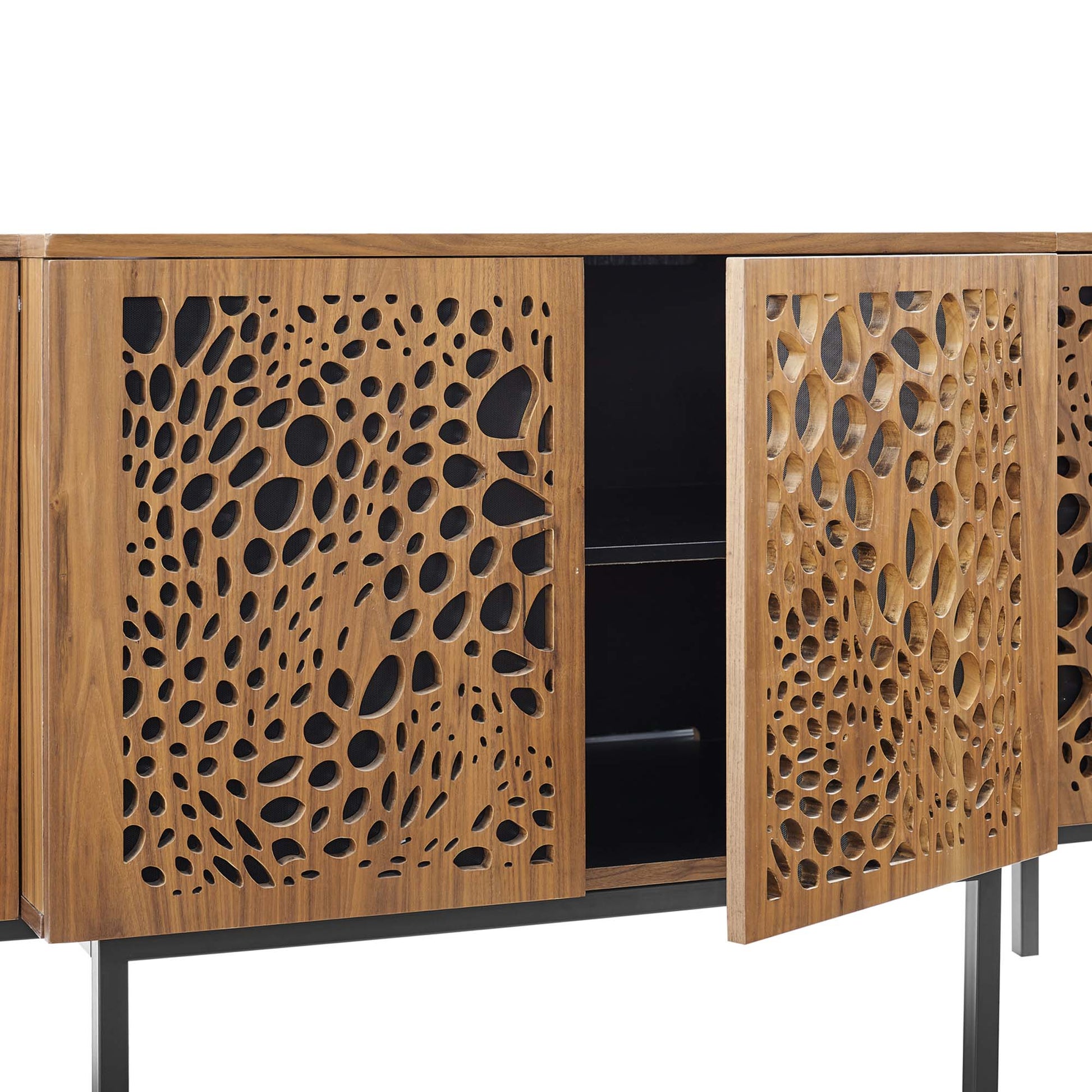 Walnut-finish sideboard with circular cutout lattice doors, black interior shelves, and slim metal legs.