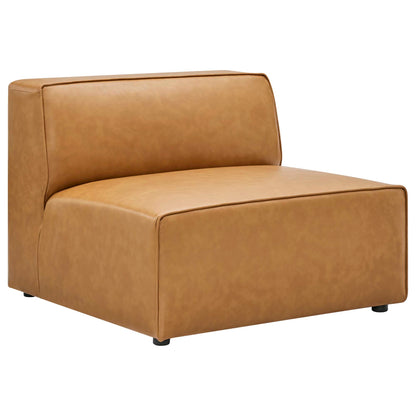 Tan faux leather lounge chair with backrest, square modern cube shape, low-profile with small black feet.