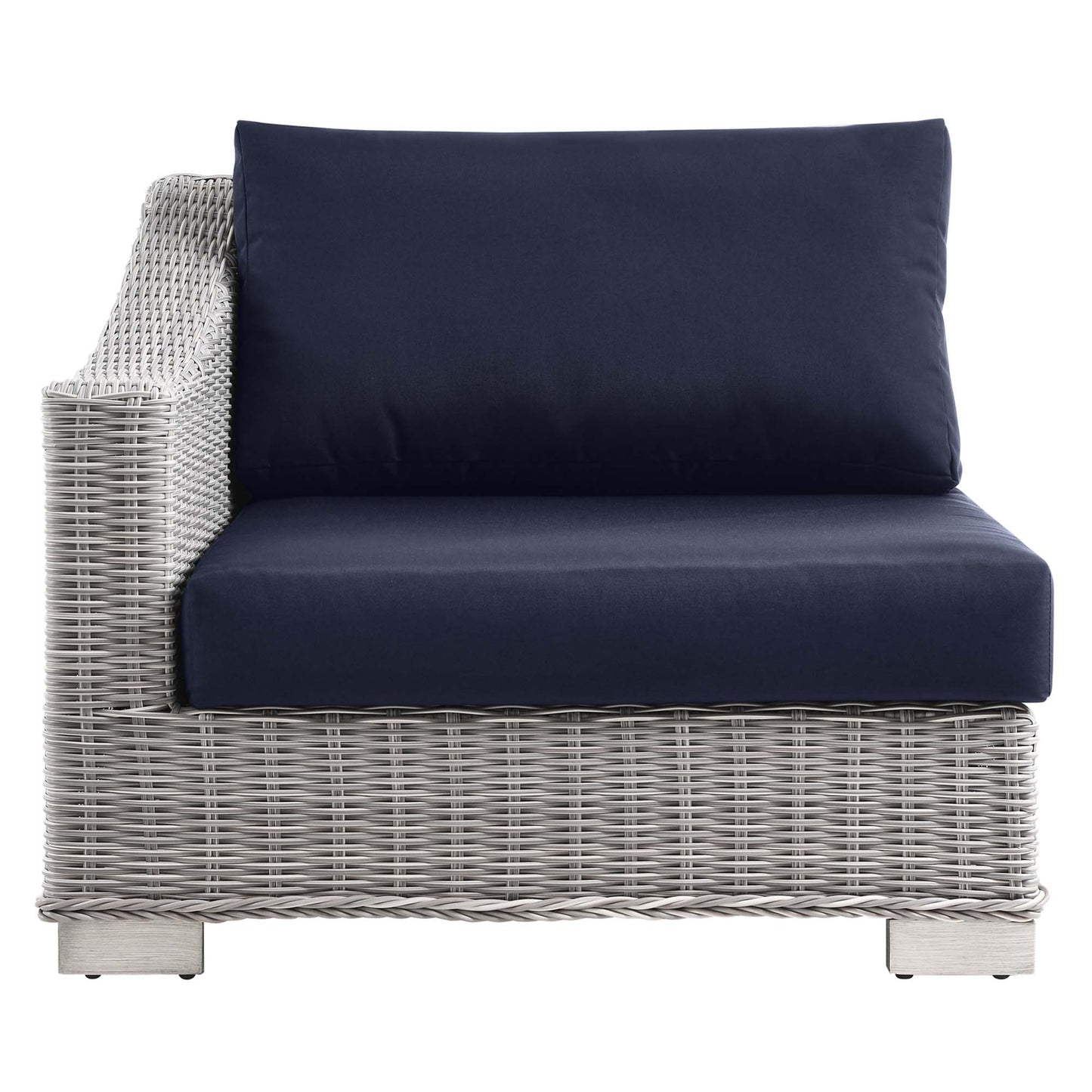 Light gray woven rattan outdoor lounge chair with navy cushions, contemporary patio seating.