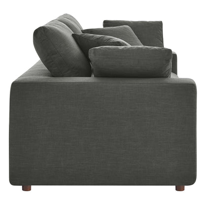 Gray textured fabric loveseat with chunky cushions, boxy arms, and short wooden legs.