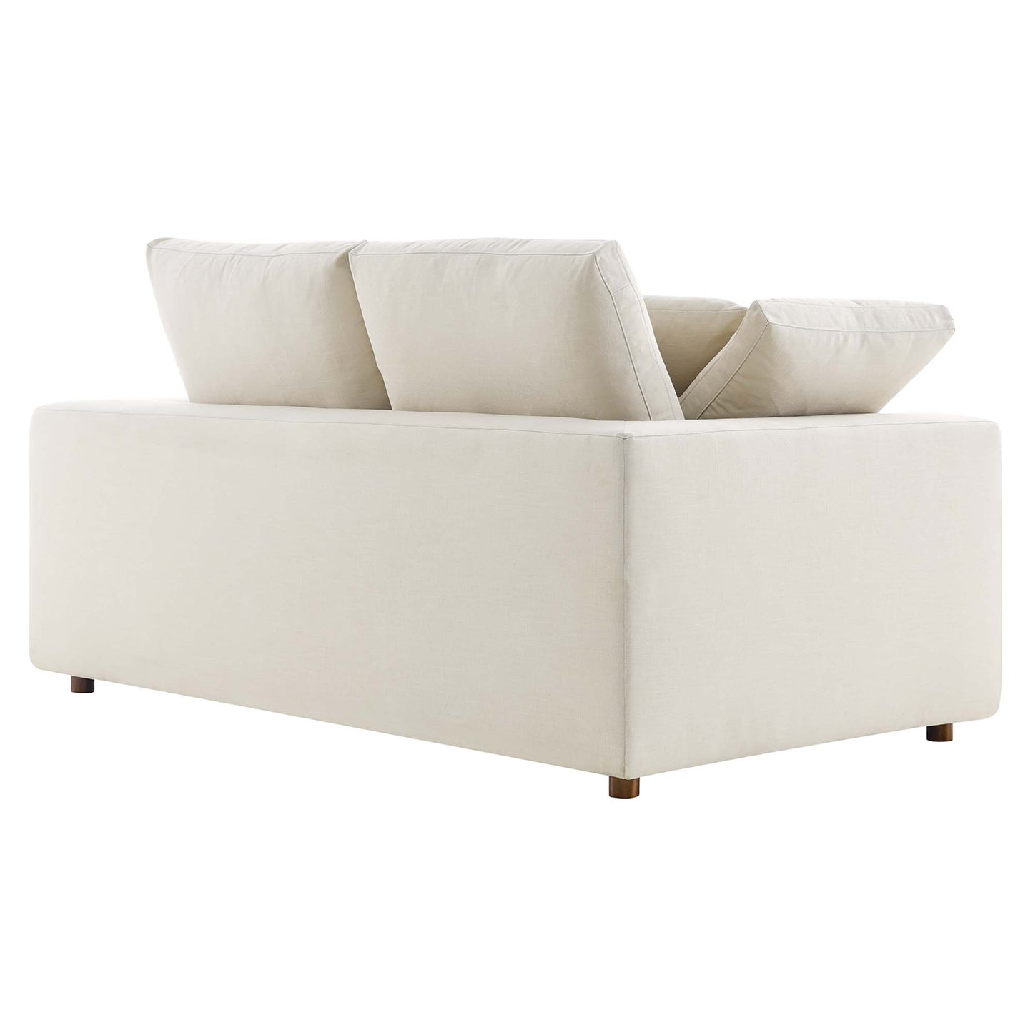 Beige loveseat with square arms and wooden legs; two back cushions and down-filled, overstuffed cushions.