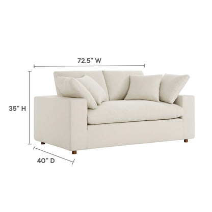 Beige fabric loveseat with boxy arms and multiple cushions, wooden legs, modern style; 72.5W x 35H x 40D.
