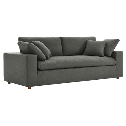 Gray fabric 3-seat sofa with plush cushions, matching throw pillows, square arms, and wooden legs.