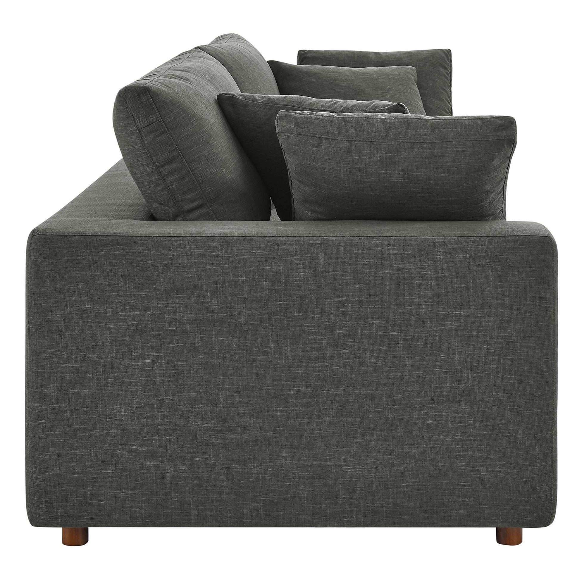 Gray textured fabric sofa with square back cushions, low arms, and short wooden legs.