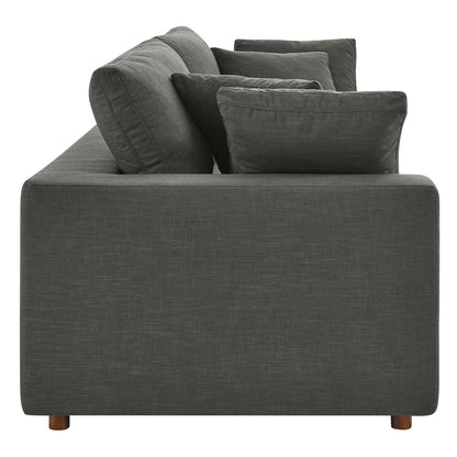 Gray textured fabric sofa with square back cushions, low arms, and short wooden legs.