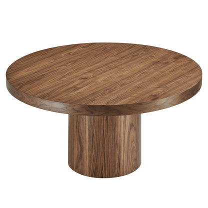 60" diameter round walnut wood dining table with a thick circular top and cylindrical pedestal base.