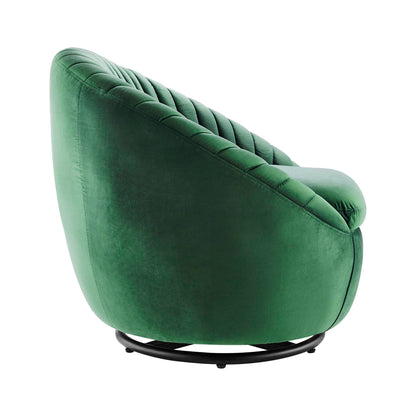 Emerald green velvet tufted swivel chair with curved back and rounded arms on a black circular base.