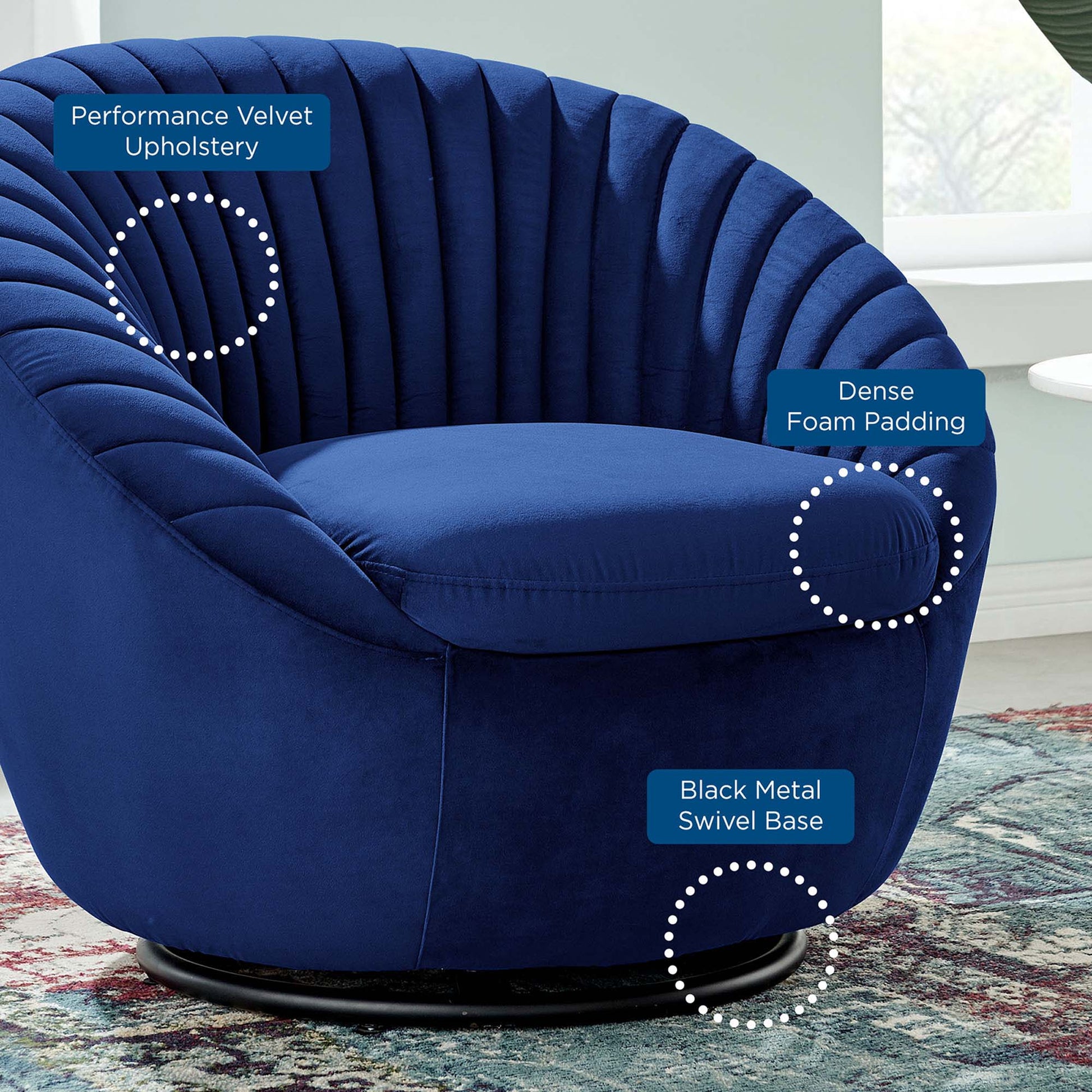Black Navy tufted performance velvet swivel chair with dense foam padding, curved back, & a black metal circular base.