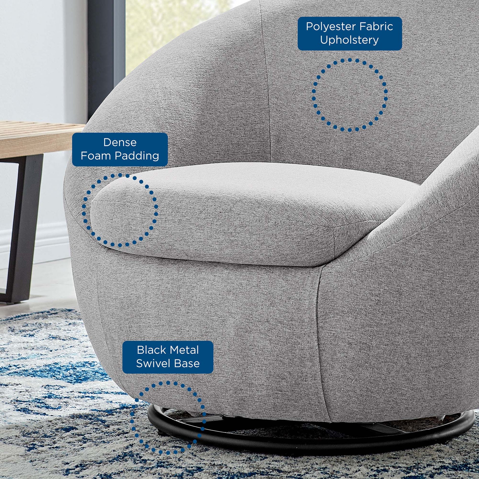 Gray rounded lounge chair with dense foam padding, polyester fabric upholstery & a black metal swivel base.
