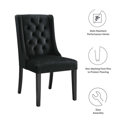 Pair of black tufted velvet dining chairs with tall backs and wooden legs; stain-resistant velvet, non-marking feet, easy to assemble.