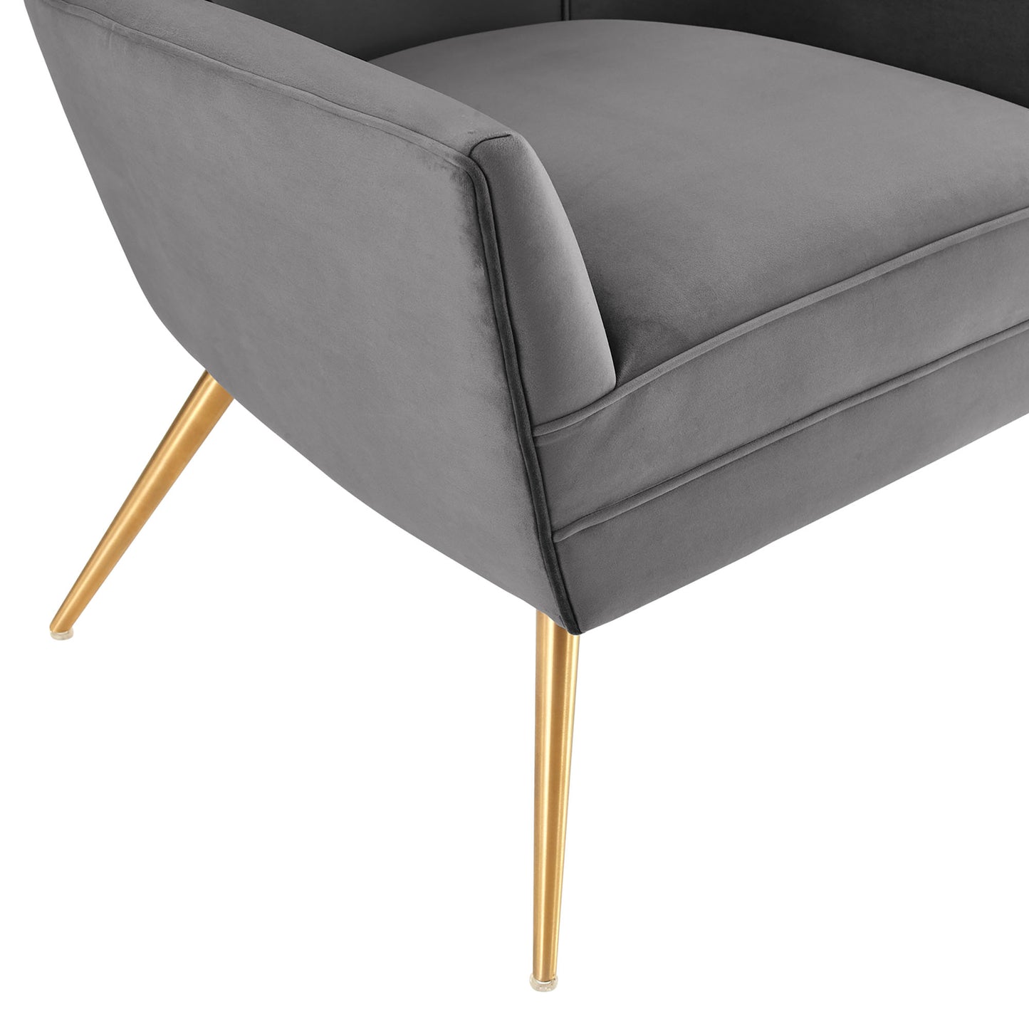 Grey velvet button-tufted armchair with gold tapered legs, mid-century modern style.