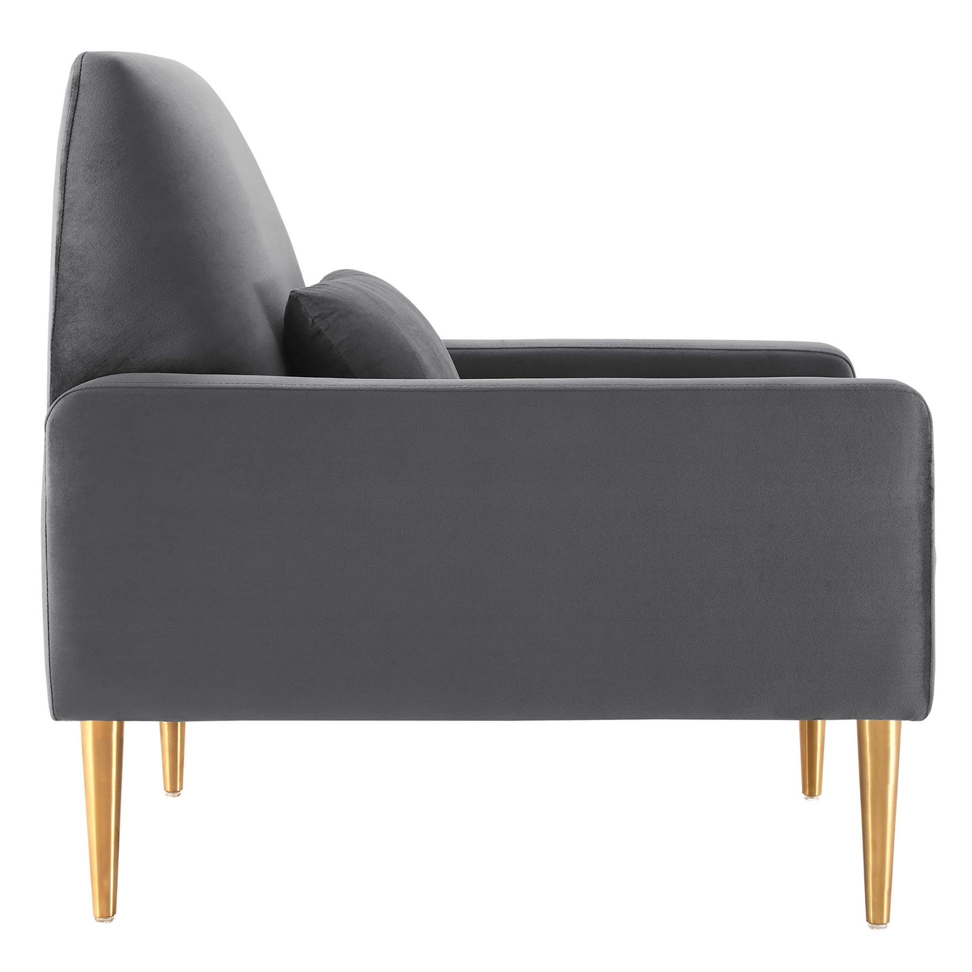 Charcoal gray velvet lounge chair with tall back, gold tapered legs and a matching bolster cushion, side view.