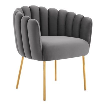 Gray velvet armchair with channel tufting and gold-tone legs.
