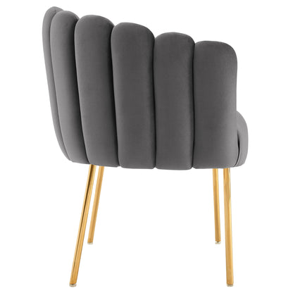 Gray channel-tufted velvet armchair with rounded back and gold metal legs