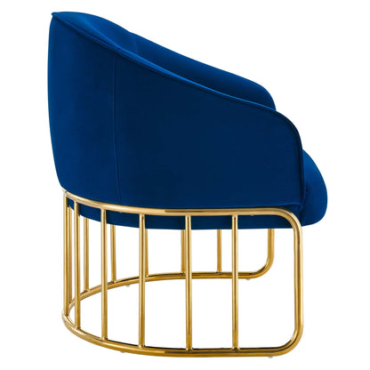 Navy blue velvet armchair with a circular gold metal base and vertical bar frame.