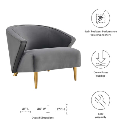 Gray velvet curved armchair with dark side panels and gold tapered legs; stain-resistant upholstery, dims 31L x 34W x 26H.