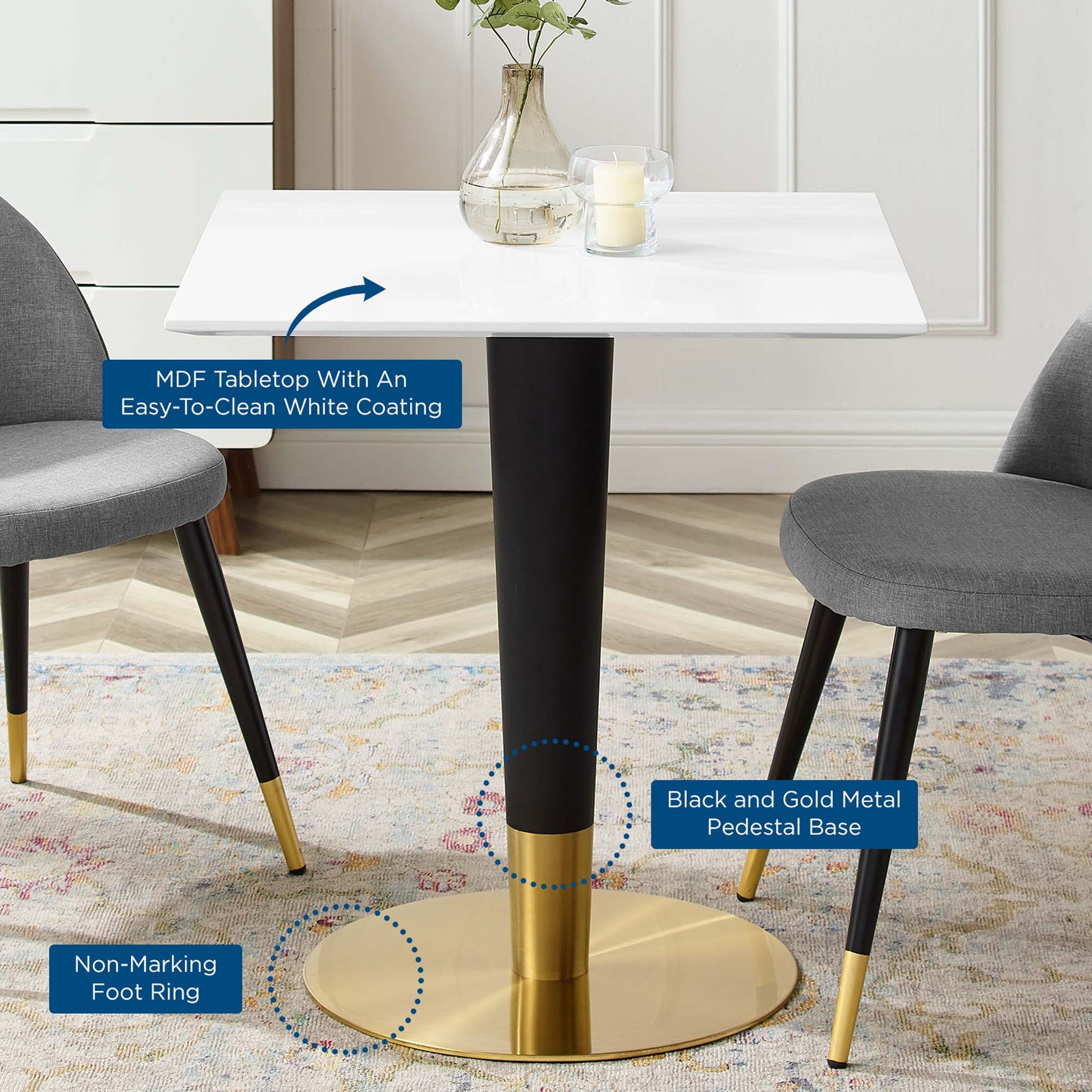 Square white MDF tabletop with easy-clean coating; black and gold pedestal base on a gold circular foot ring.