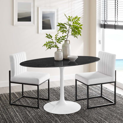 Round black marble-top dining table with white pedestal base, black-framed white upholstered chairs, greenery decor.