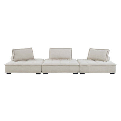 Beige tufted 3-piece modular sectional sofa with back cushions and low black feet.