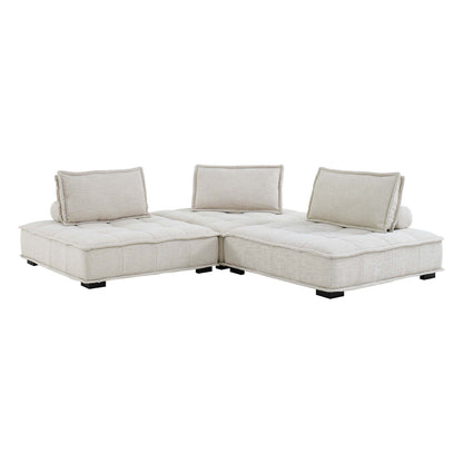 Brown fabric modular L-shaped sectional sofa with tufted cushions and low black legs.