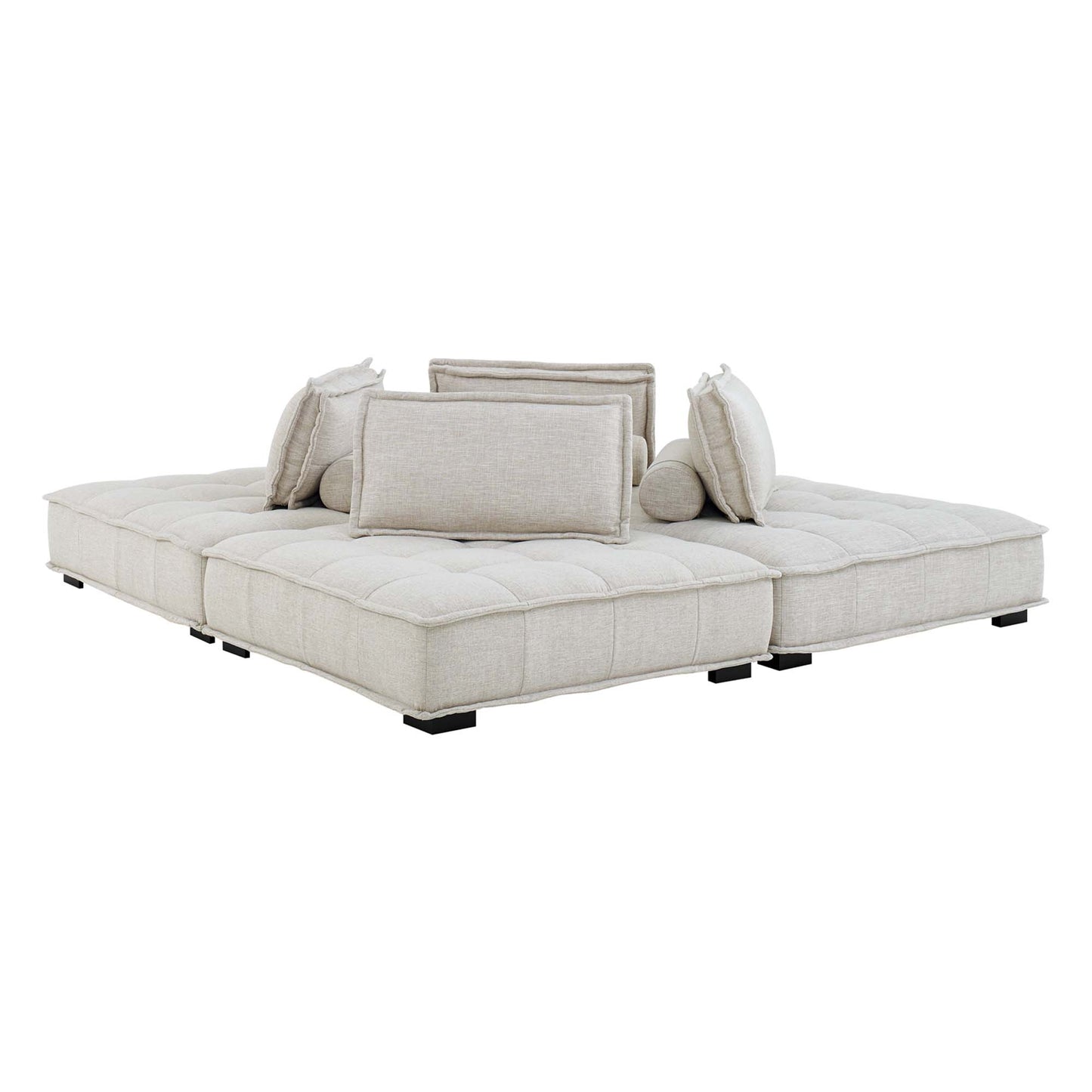 Beige tufted fabric modular sectional sofa with multiple back and bolster cushions and low square legs.