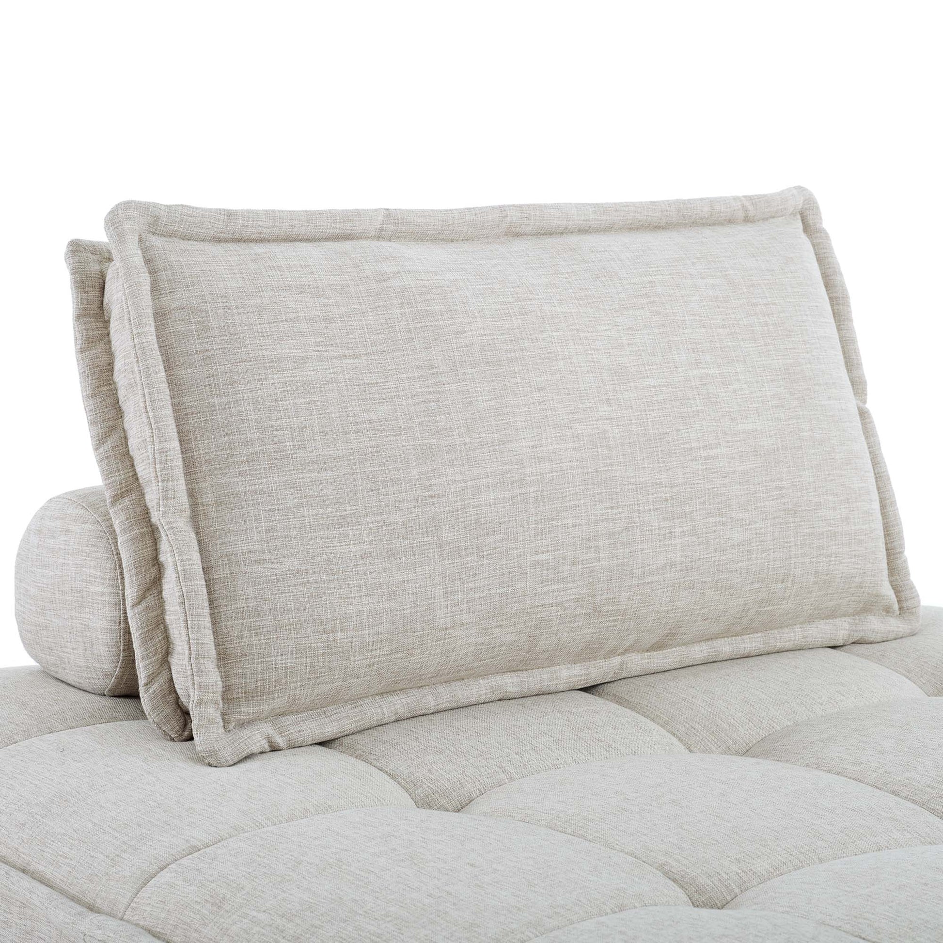 Beige back cushions with a matching bolster on a tufted 5-piece fabric sectional sofa.