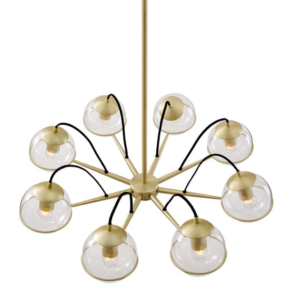 Gold sputnik chandelier with clear glass globe shades on radiating arms, ceiling rod, modern mid-century style.
