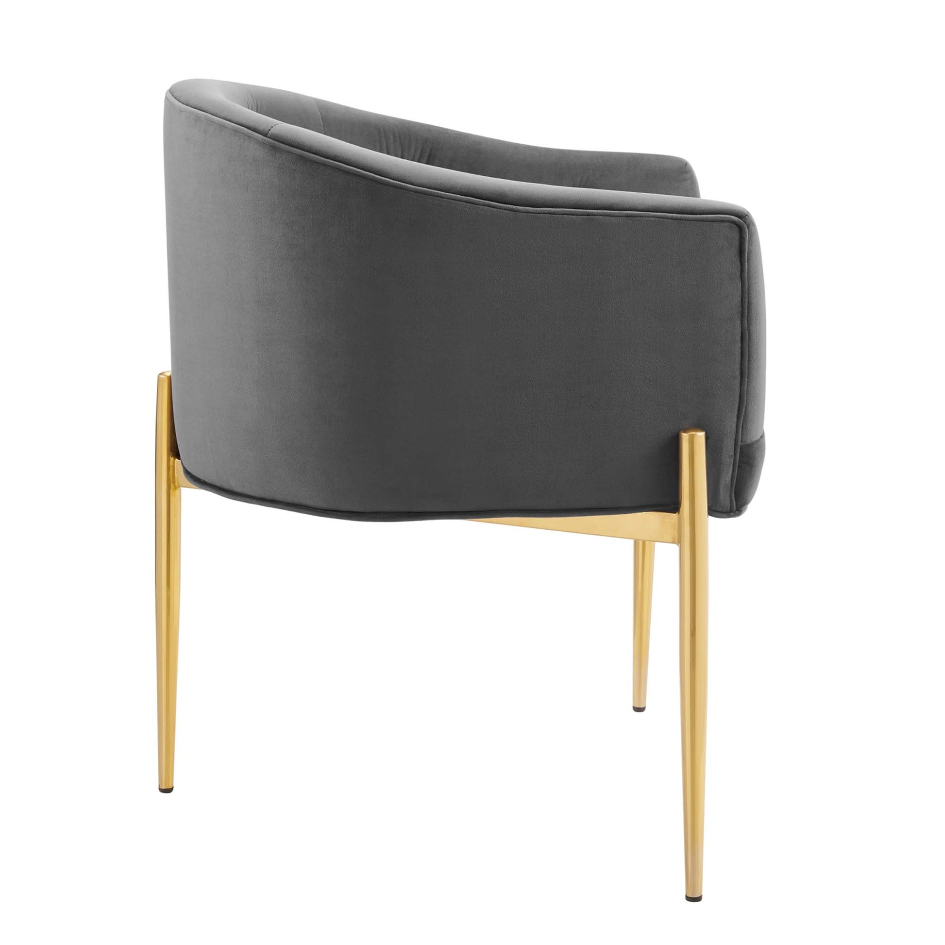 Grey velvet curved-back lounge chair with slender gold-tone legs, modern mid-century style.