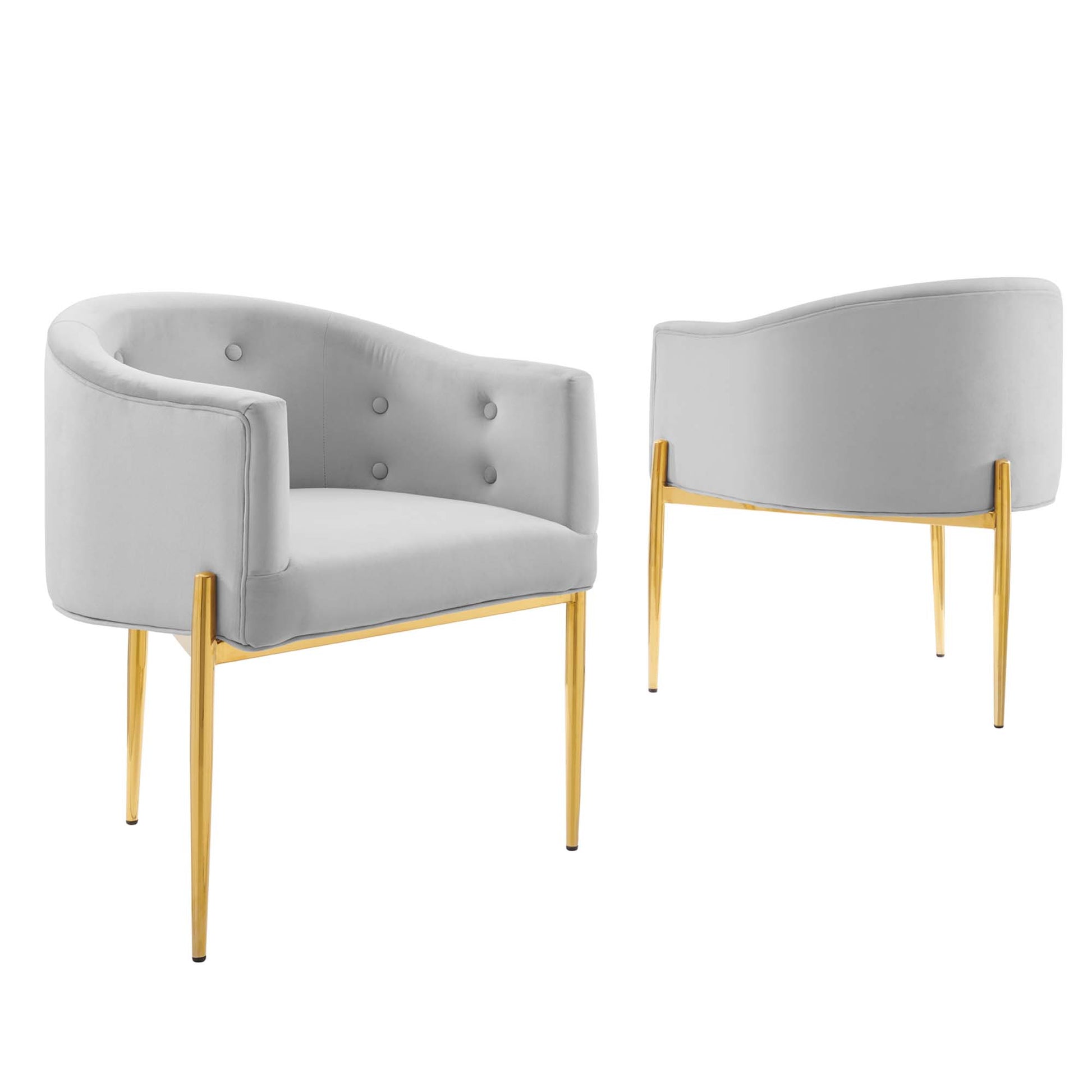 Pair of gray velvet accent chairs with gold tapered legs, curved back, and subtle button tufting for modern living room.