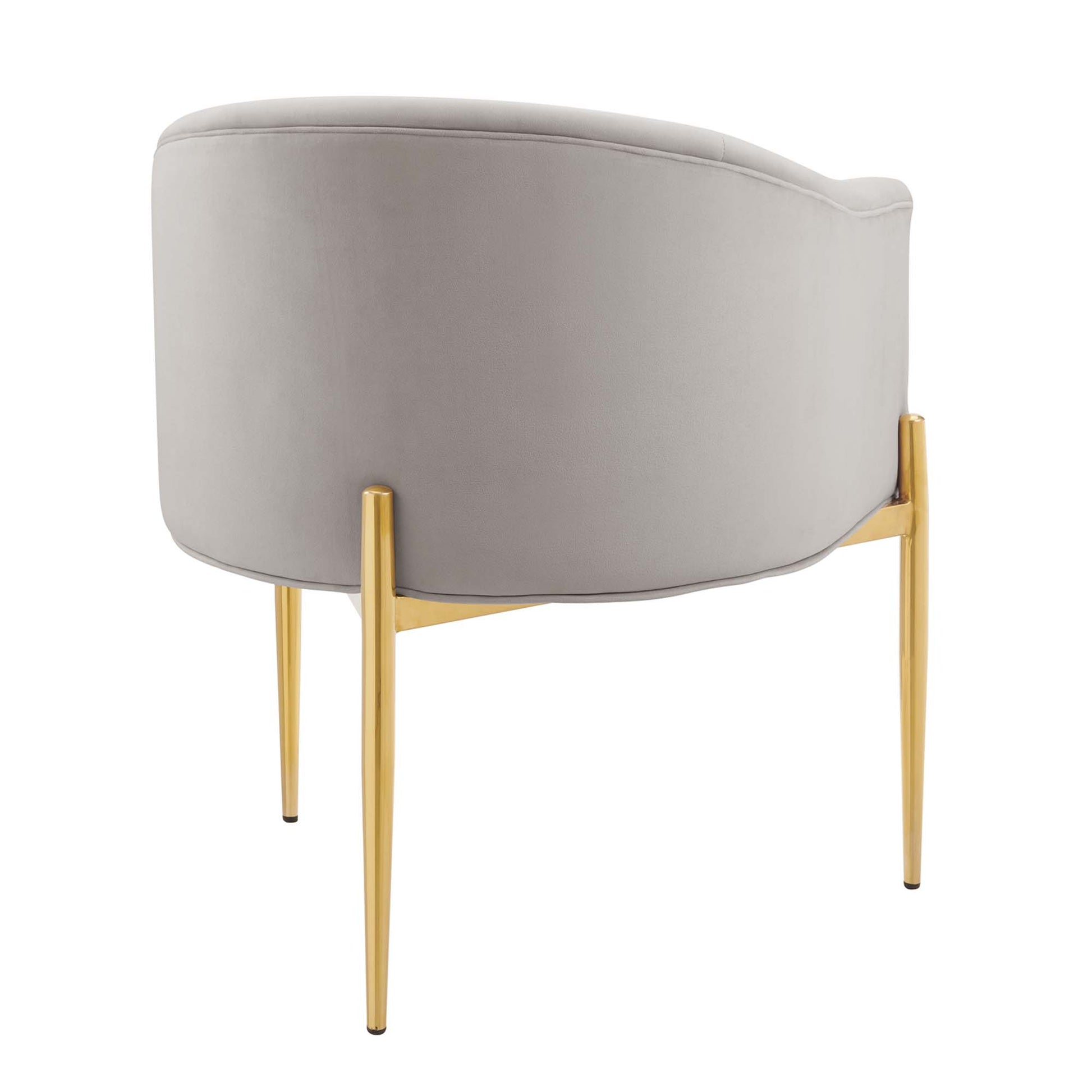 Light gray velvet barrel chair with curved back, gold metal legs, modern glam style.