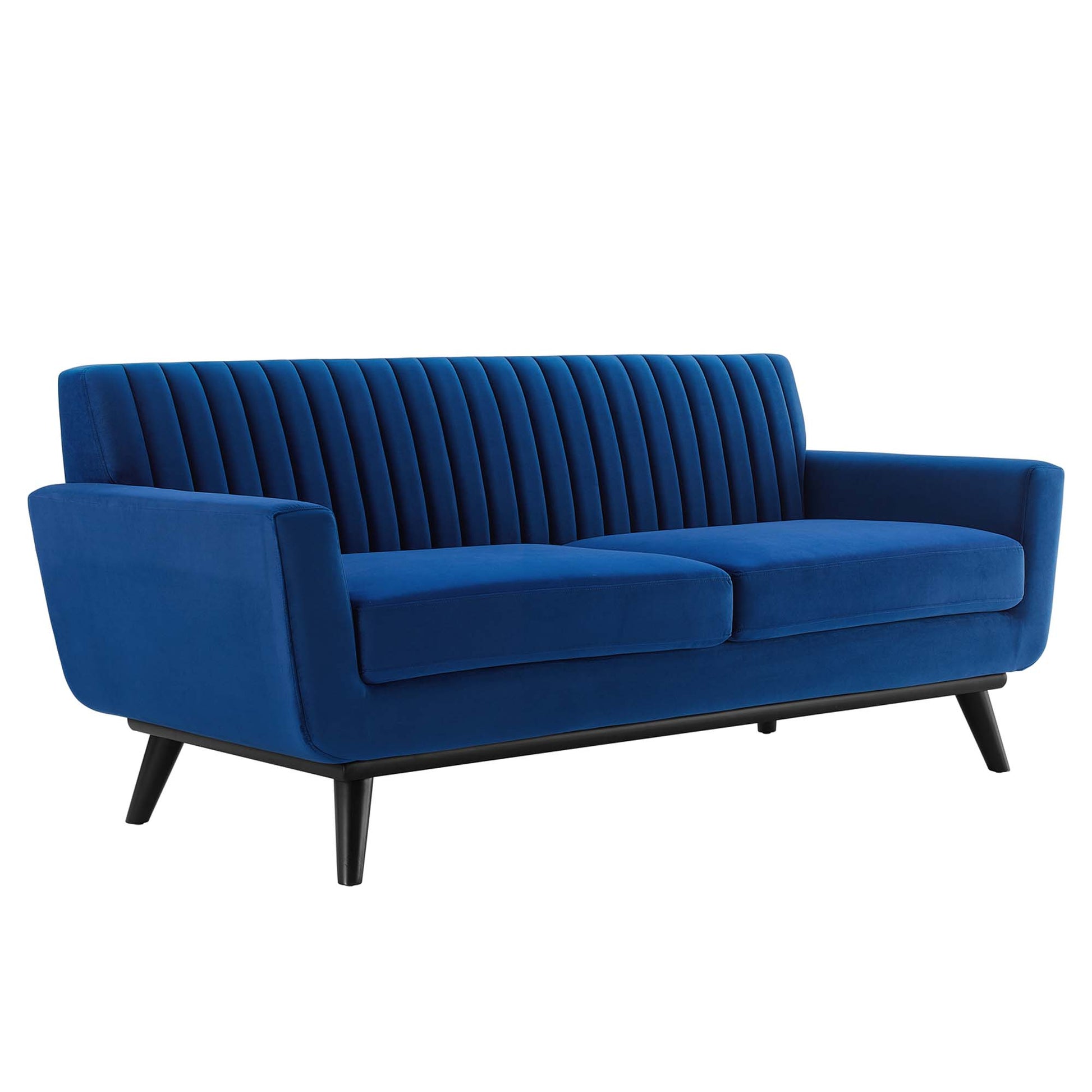 Navy blue velvet loveseat with vertical channel tufting on the back, two plush seat cushions, and black angled legs.