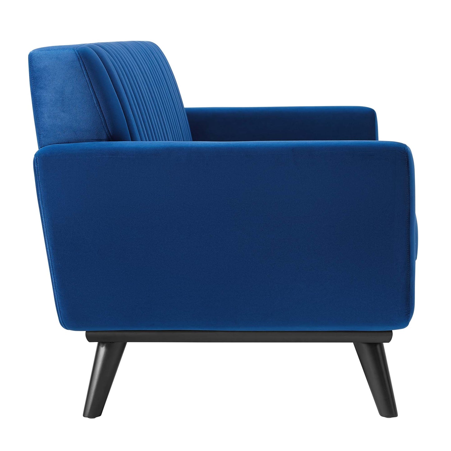 Navy velvet loveseat in mid-century modern style with channel-tufted back, square arms, and angled black legs.