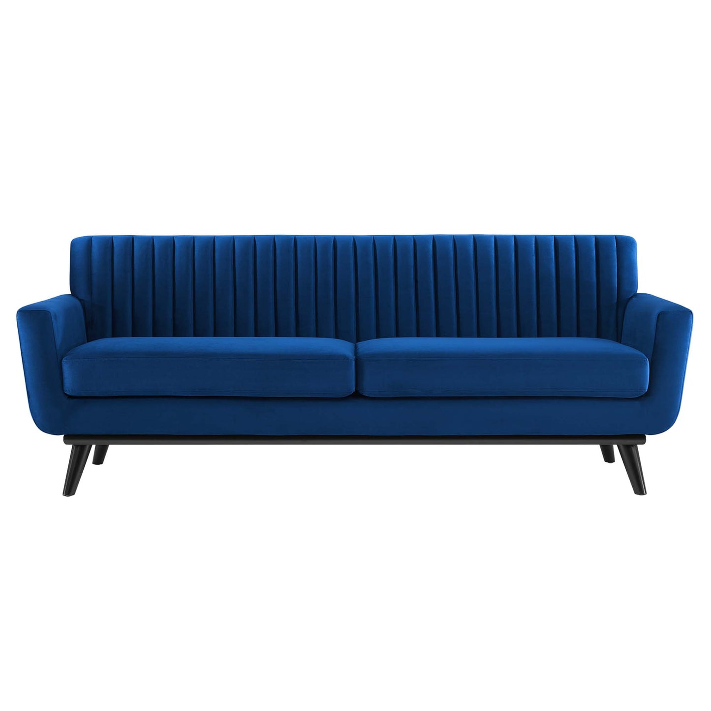 Navy blue velvet sofa with vertical channel tufting, two seat cushions and angled mid-century legs.