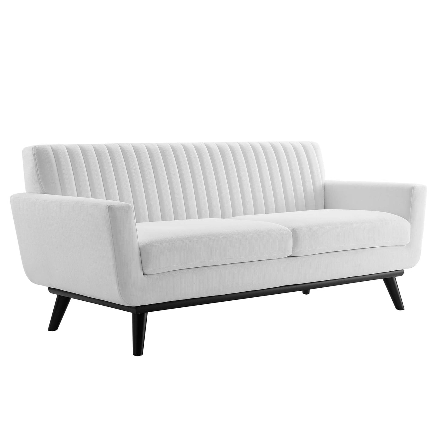 White fabric loveseat with channel-tufted back, two seat cushions and black tapered legs.