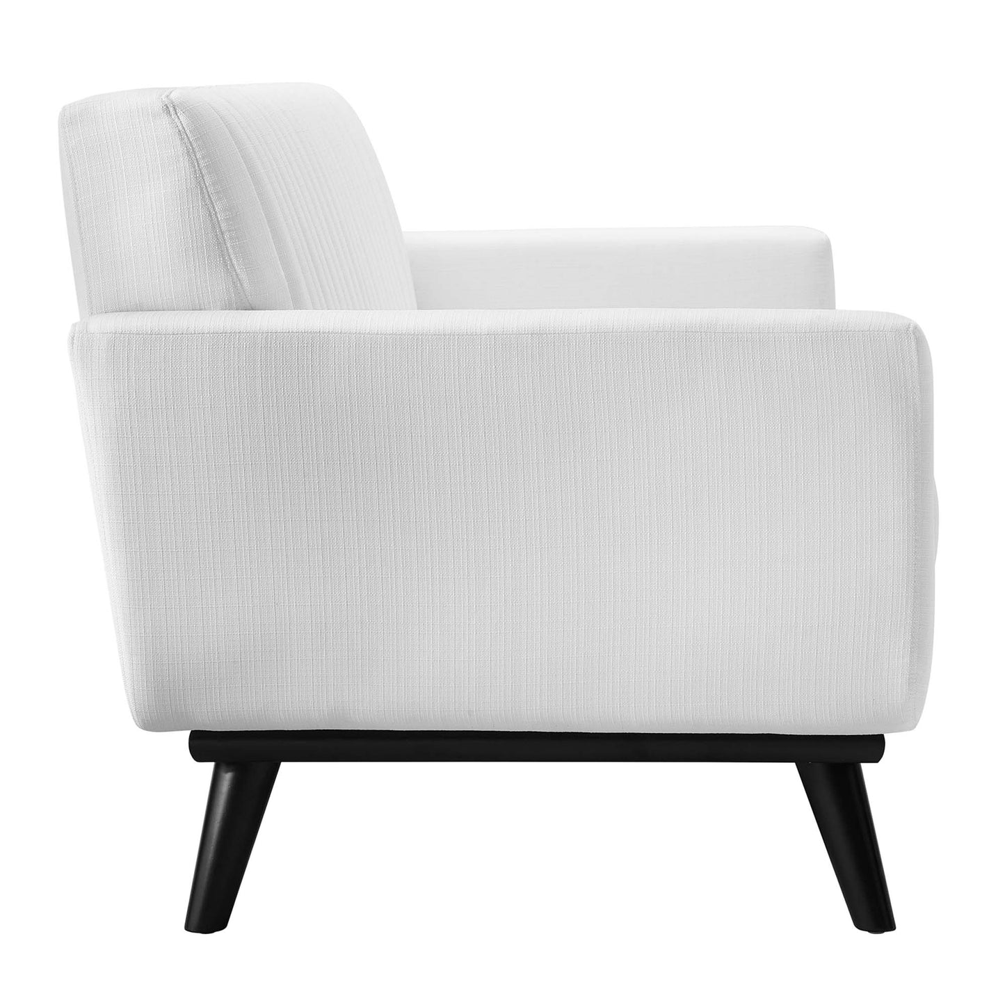 White fabric loveseat with black angled legs, channel-tufted back, mid-century modern design, cozy living room seating.