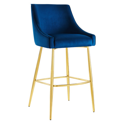 Navy velvet bar stool with curved back, gold metal legs & circular footrest.