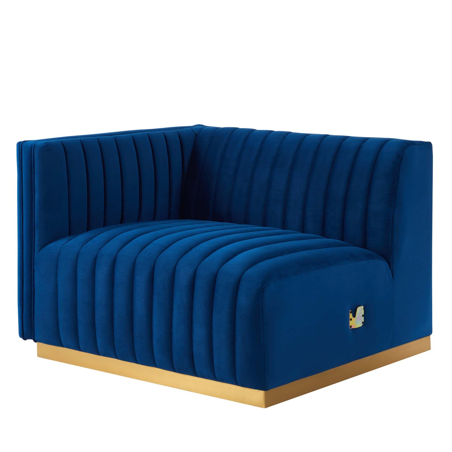 Navy blue velvet curved left-arm chair with vertical channel tufting on a gold base.