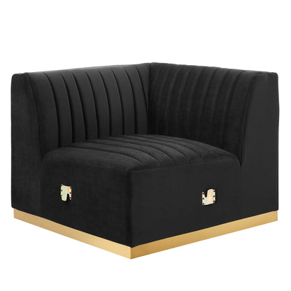 Black velvet right corner chair with vertical channel tufting & gold metal base trim.