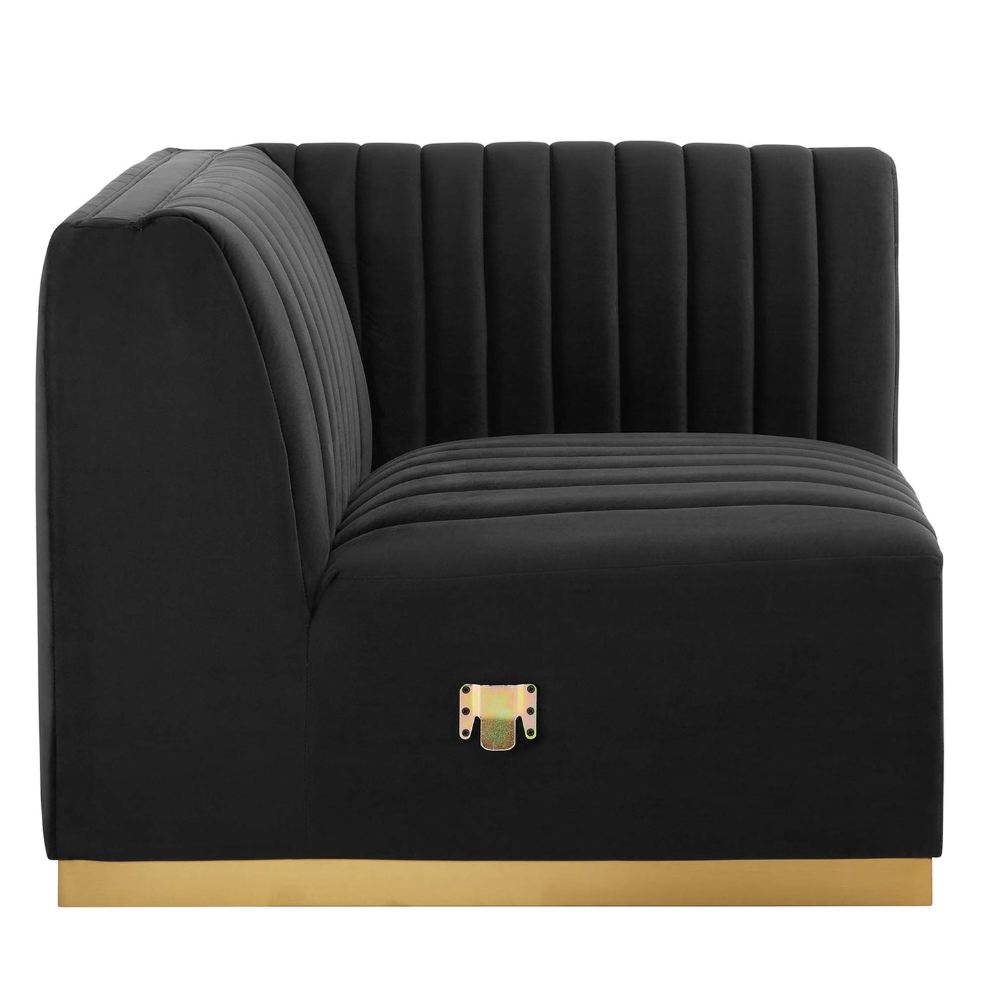 Black velvet right corner chair with gold base, vertical channel tufting, curved right arm, modern luxe style.