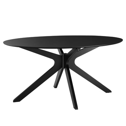 Oval black dining table with sculptural matte black metal base and angled legs.