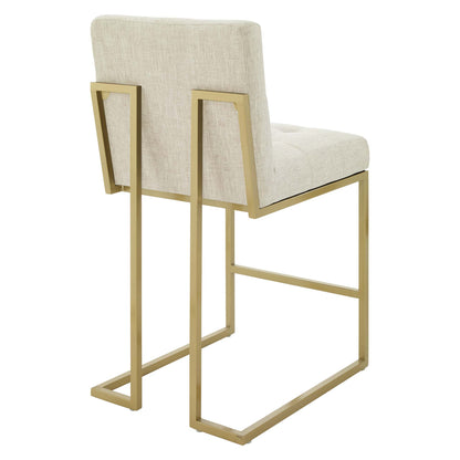 Brown upholstered counter stools with a gold metal rectangular cantilever frame and cushioned backrests (set of 2).
